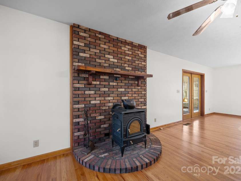 390 Hollow Wood Lane, Tryon, NC 28782.  MLS# CAR4185566, YatesRealty ID 23663. 