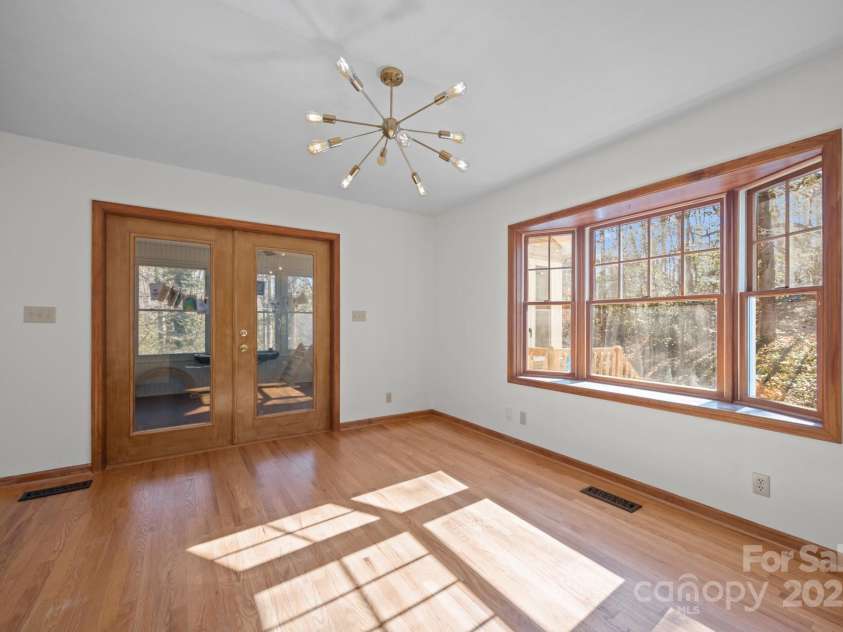 390 Hollow Wood Lane, Tryon, NC 28782.  MLS# CAR4185566, YatesRealty ID 23663. 