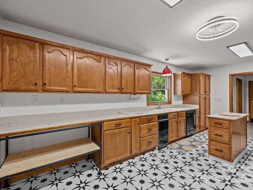 390 Hollow Wood Lane, Tryon, NC 28782.  MLS# CAR4185566, YatesRealty ID 23663. 