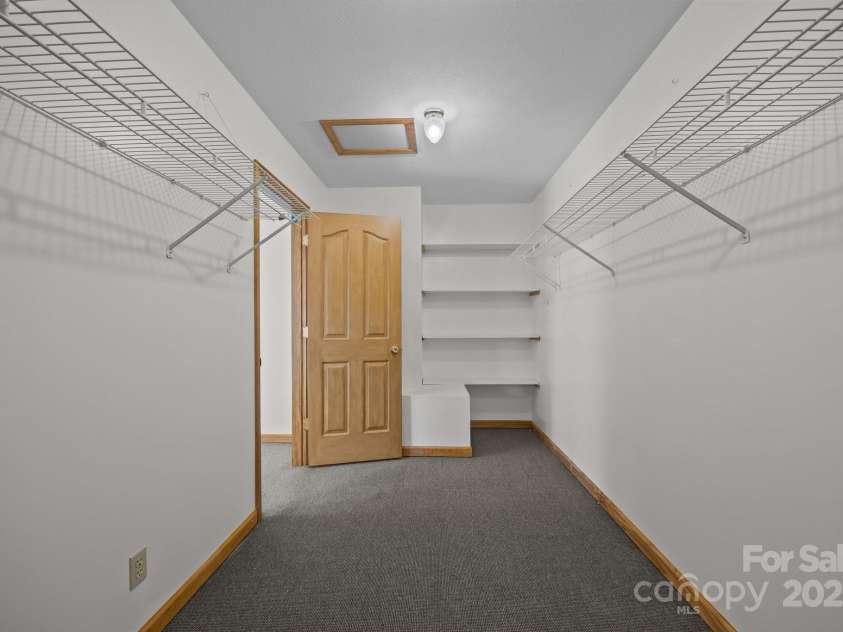 390 Hollow Wood Lane, Tryon, NC 28782.  MLS# CAR4185566, YatesRealty ID 23663. 