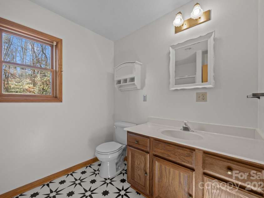 390 Hollow Wood Lane, Tryon, NC 28782.  MLS# CAR4185566, YatesRealty ID 23663. 