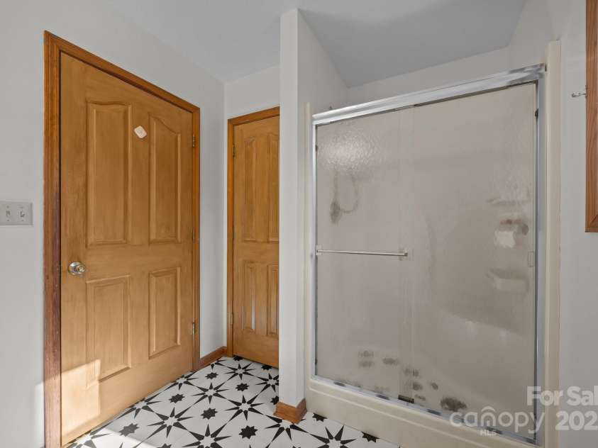 390 Hollow Wood Lane, Tryon, NC 28782.  MLS# CAR4185566, YatesRealty ID 23663. 