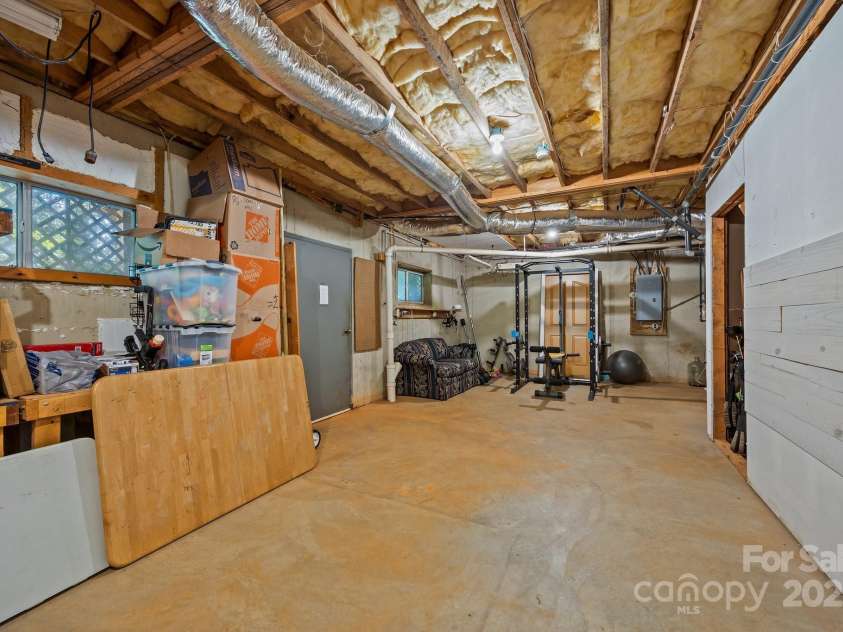 390 Hollow Wood Lane, Tryon, NC 28782.  MLS# CAR4185566, YatesRealty ID 23663. 