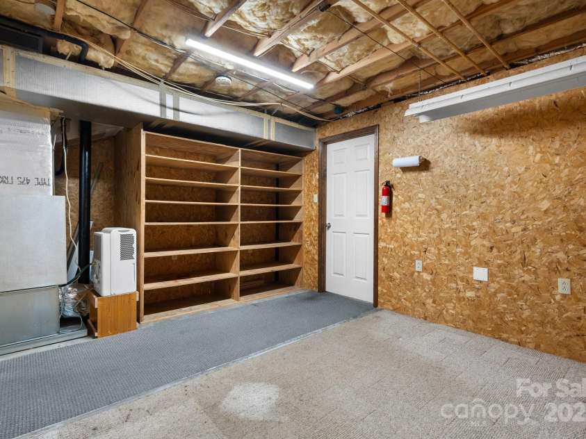 4007 Black Oak Road, Hickory, NC 28602.  MLS# CAR4268040, YatesRealty ID 23664. Tool/workshop in basement