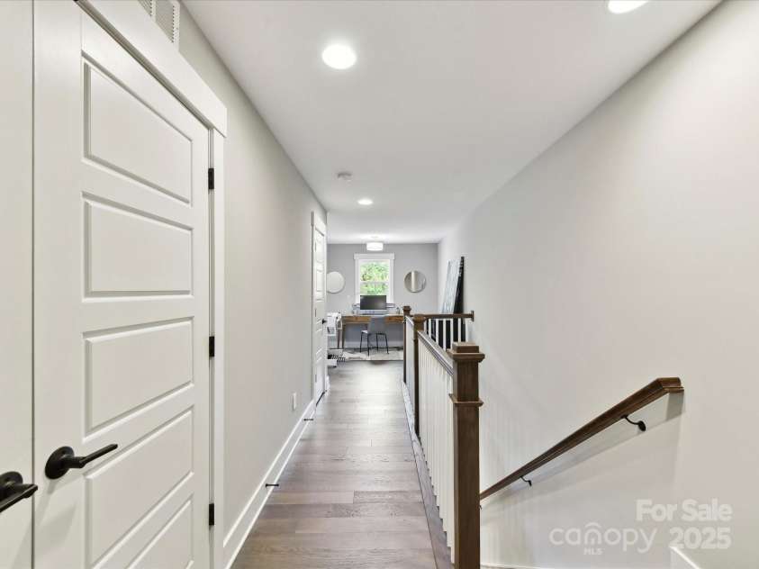 2517 Marlowe Avenue, Charlotte, NC 28208.  MLS# CAR4263015, YatesRealty ID 23670. Upstairs Hallway-View of Loft