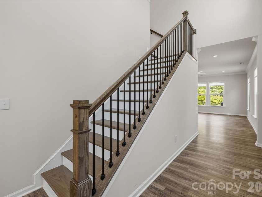 23206 Clarabelle Drive, Charlotte, NC 28273.  MLS# CAR4381832, YatesRealty ID 23672. Beautiful stair railing