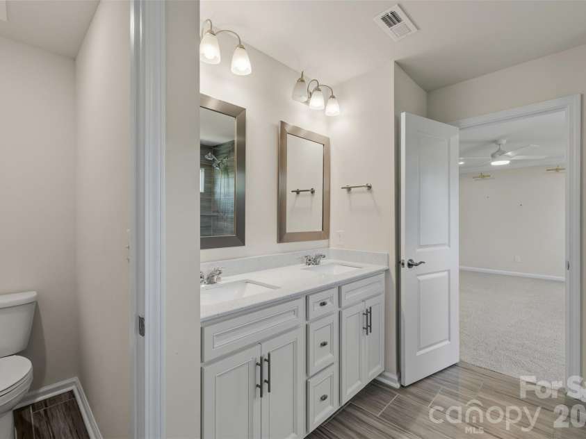 23206 Clarabelle Drive, Charlotte, NC 28273.  MLS# CAR4381832, YatesRealty ID 23672. Double vanities