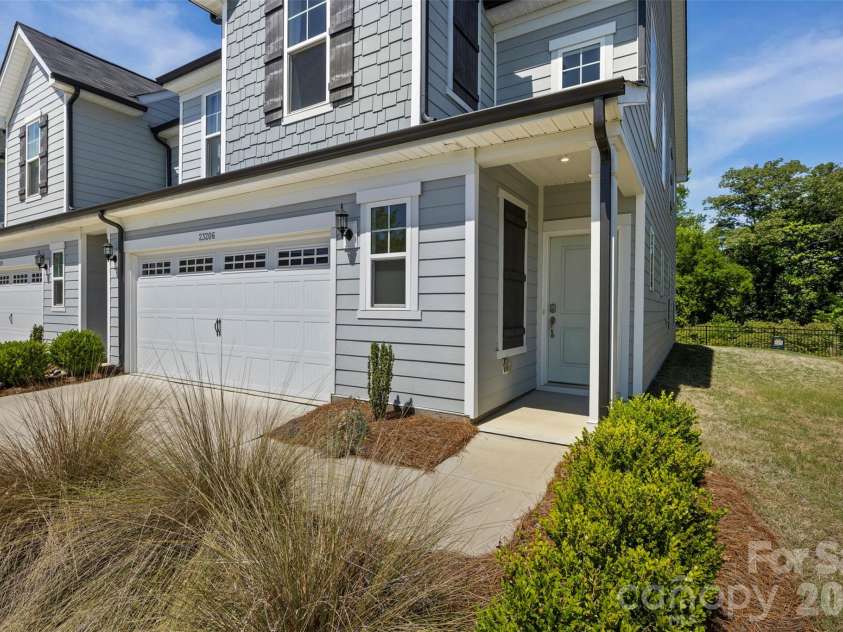 23206 Clarabelle Drive, Charlotte, NC 28273.  MLS# CAR4381832, YatesRealty ID 23672. Two car garage