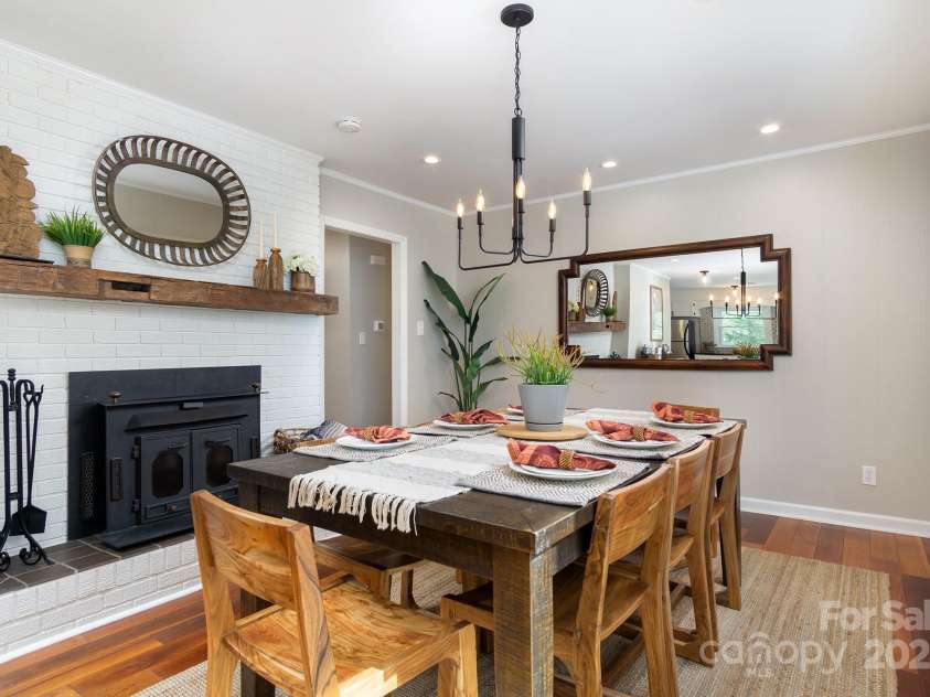 143 Oakview Road, Asheville, NC 28806.  MLS# CAR4252612, YatesRealty ID 23673. Dine aside a cozy wood fire.