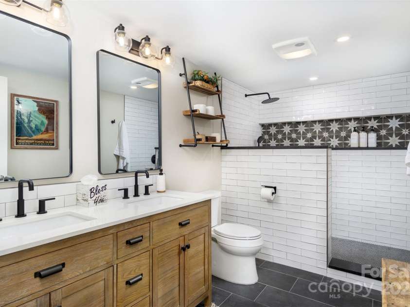 143 Oakview Road, Asheville, NC 28806.  MLS# CAR4252612, YatesRealty ID 23673. Downstairs Bathroom