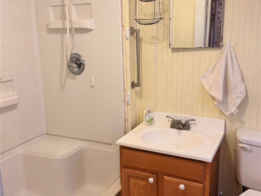 54 SchoolHouse Drive, Canton, NC 28716.  MLS# CAR4310849, YatesRealty ID 23673. Bath
