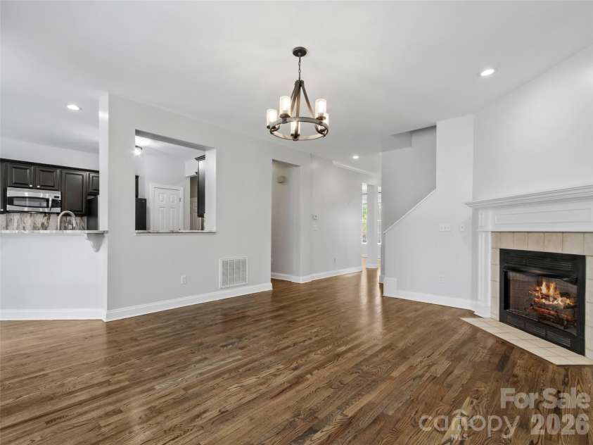 107 Mountain Drive, Biltmore Lake, NC 28715.  MLS# CAR4354478, YatesRealty ID 23674. Great room looking into kitchen