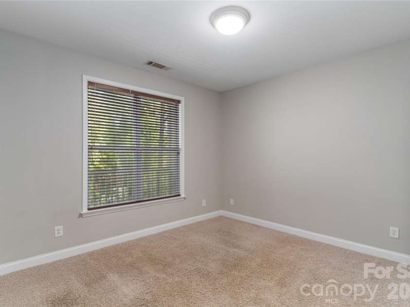 1000 Woodlawn Road, Charlotte, NC 28209.  MLS# CAR4420305, YatesRealty ID 2368. Secondary bedroom