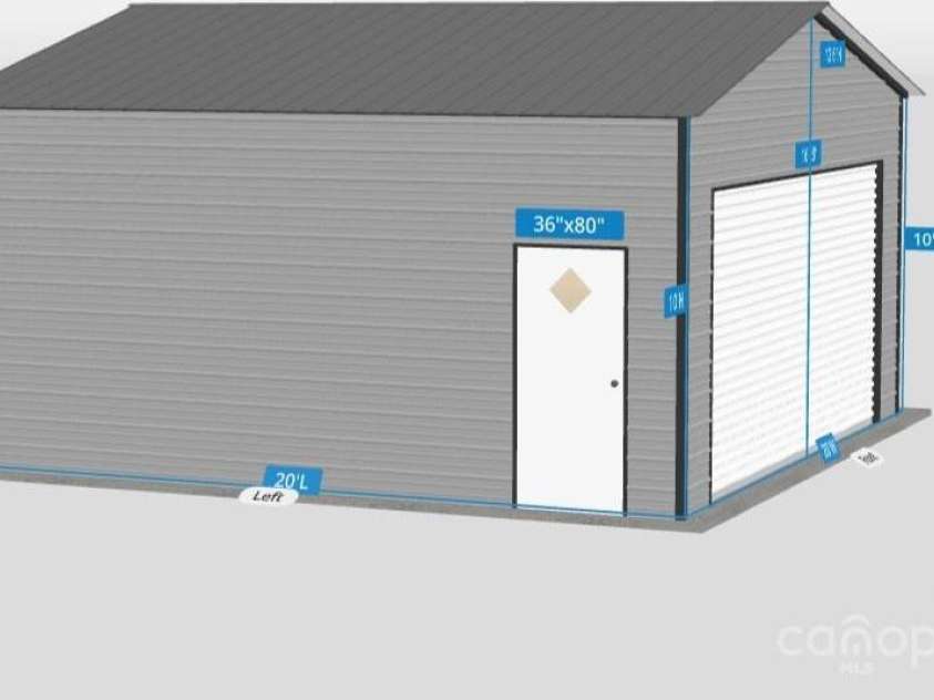 1436 Panther Road, Lancaster, SC 29720.  MLS# CAR4195976, YatesRealty ID 2368. 16' by 8' roll up door with opener and man door