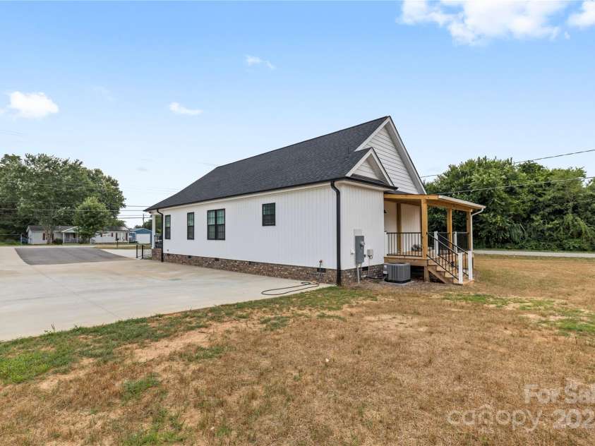 3511 Warlicks Church Road, Connelly Springs, NC 28612.  MLS# CAR4274924, YatesRealty ID 23680. Back yard and a lot of parking