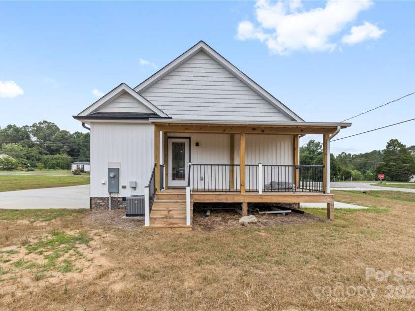 3511 Warlicks Church Road, Connelly Springs, NC 28612.  MLS# CAR4274924, YatesRealty ID 23680. Back yard and back porch