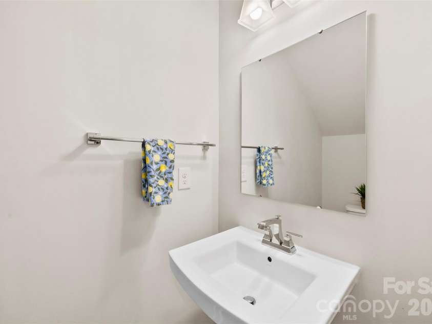 614 Crudent Road, Tega Cay, SC 29708.  MLS# CAR4383720, YatesRealty ID 23685. 2nd level half bath