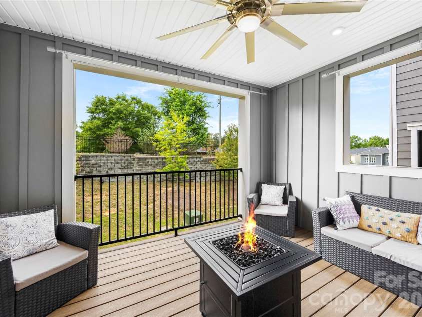 614 Crudent Road, Tega Cay, SC 29708.  MLS# CAR4383720, YatesRealty ID 23685. 2nd level patio off kithen