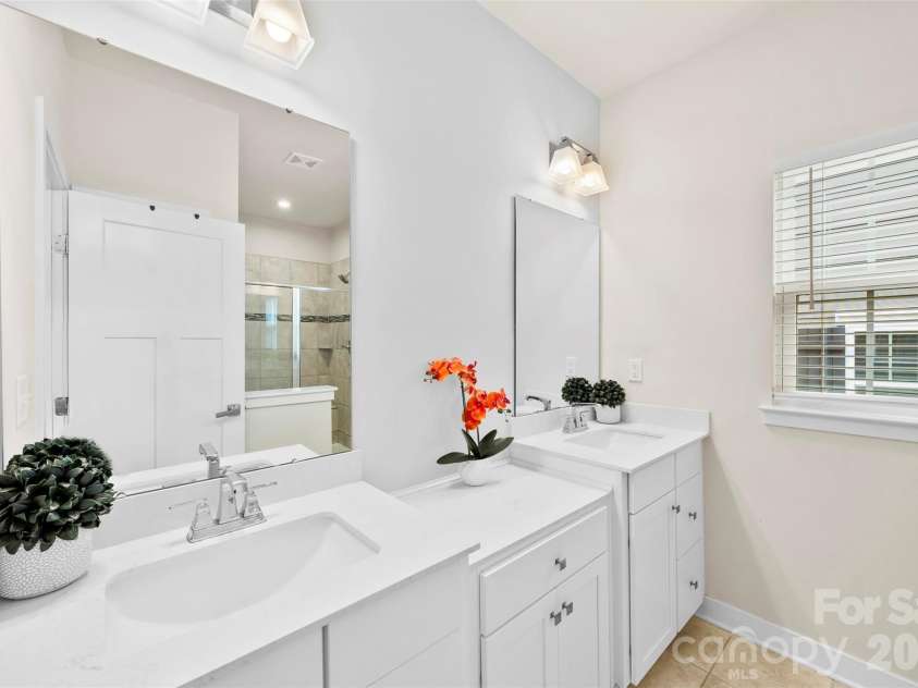 614 Crudent Road, Tega Cay, SC 29708.  MLS# CAR4383720, YatesRealty ID 23685. 3rd level primary bedroom ensuite