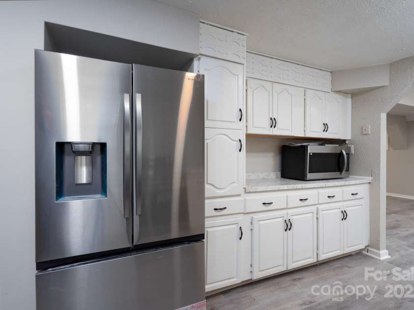 2617 Shady Lane Avenue, Concord, NC 28027.  MLS# CAR4268021, YatesRealty ID 23686. Basement Main - Kitchen