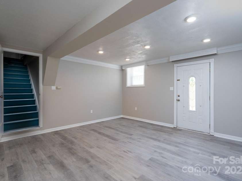 2617 Shady Lane Avenue, Concord, NC 28027.  MLS# CAR4268021, YatesRealty ID 23686. Basement Main - Living Room
