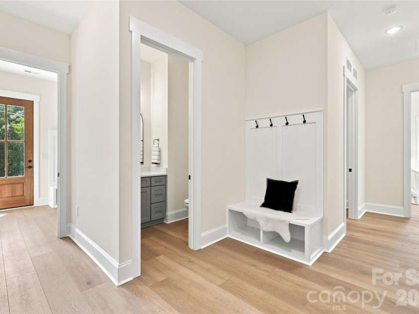 9745 Flowes Store Road, Midland, NC 28107.  MLS# CAR4383070, YatesRealty ID 23689. Representative of previous built Arbor: Mudroom to 1/2 bath & second drop zone)