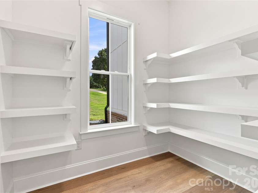 9745 Flowes Store Road, Midland, NC 28107.  MLS# CAR4383070, YatesRealty ID 23689. Representative of previous built Arbor: Pantry