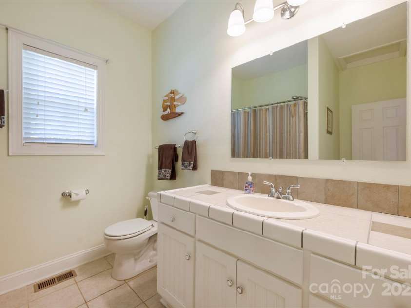 4478 Lake Drive, Sherrills Ford, NC 28673.  MLS# CAR4276198, YatesRealty ID 23691. Main floor bathroom
