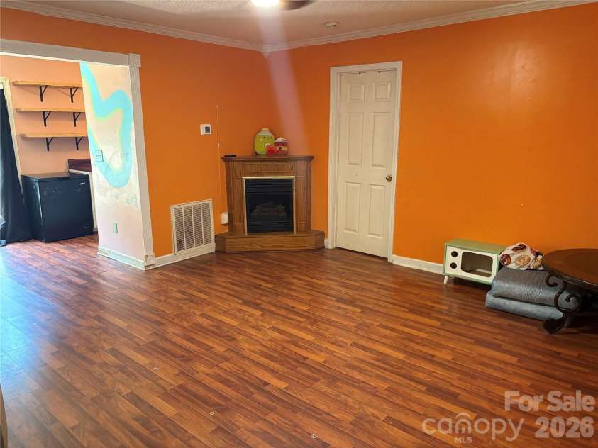 1721 Fallston Road, Shelby, NC 28150.  MLS# CAR4382930, YatesRealty ID 23692. Main living area showing fireplace
