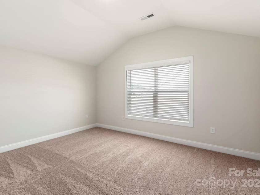 124 Rills Crossing Way, Troutman, NC 28166.  MLS# CAR4334341, YatesRealty ID 23696. Bedroom #2 upstairs