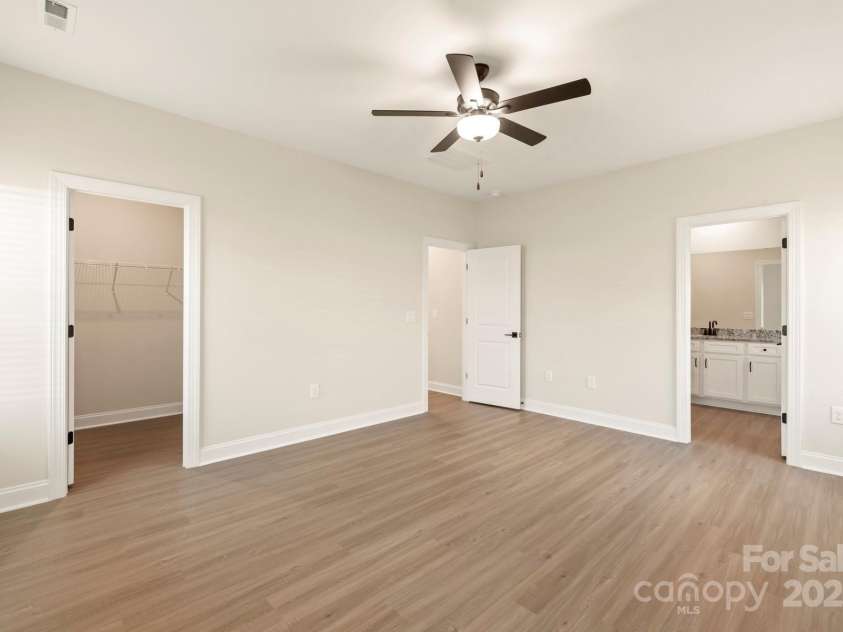 124 Rills Crossing Way, Troutman, NC 28166.  MLS# CAR4334341, YatesRealty ID 23696. Master on main level