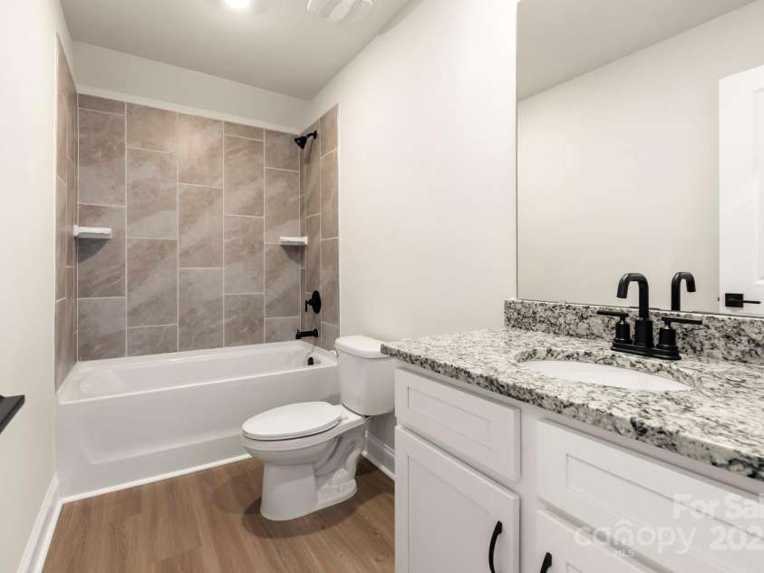 124 Rills Crossing Way, Troutman, NC 28166.  MLS# CAR4334341, YatesRealty ID 23696. Secondary bedroom