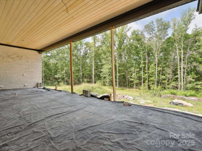 8018 Fairmont Drive, Waxhaw, NC 28173.  MLS# CAR4276331, YatesRealty ID 23700. Covered patio