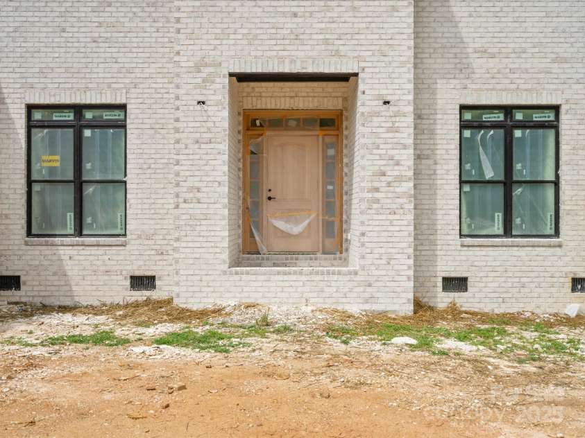 8018 Fairmont Drive, Waxhaw, NC 28173.  MLS# CAR4276331, YatesRealty ID 23700. Front Door