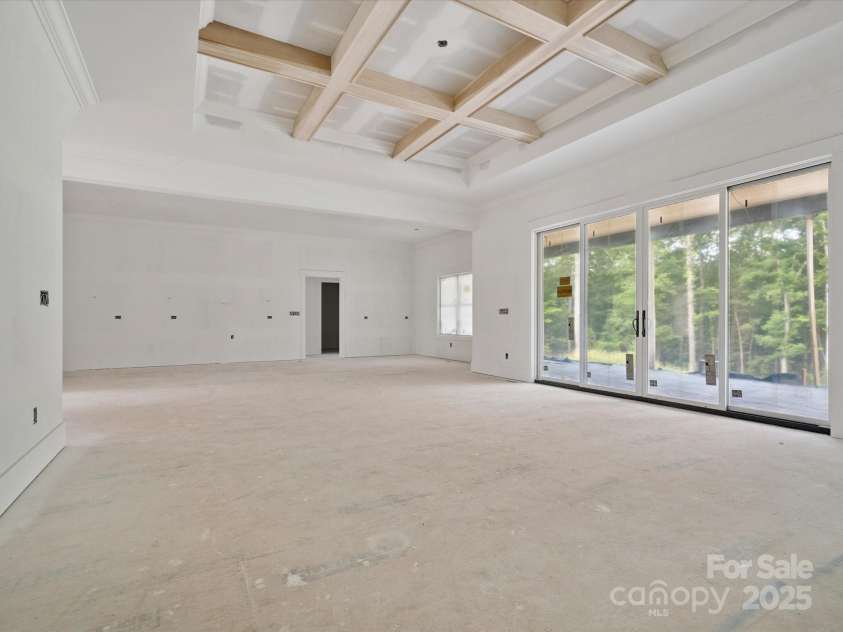 8018 Fairmont Drive, Waxhaw, NC 28173.  MLS# CAR4276331, YatesRealty ID 23700. Great room, kitchen, patio