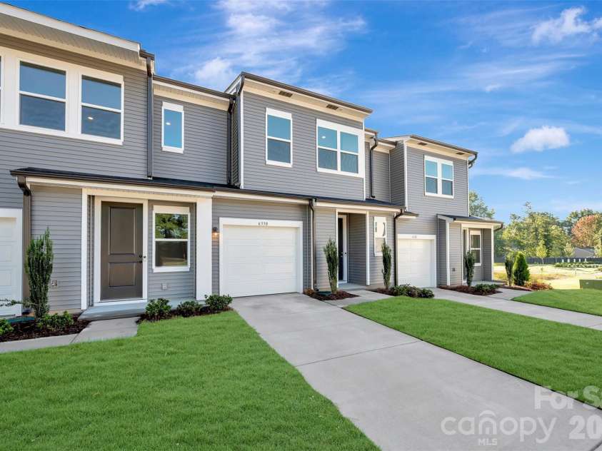 6330 Haller Street, Charlotte, NC 28227.  MLS# CAR4384144, YatesRealty ID 23703. Covered Front Entrance & Front-Load Garage
