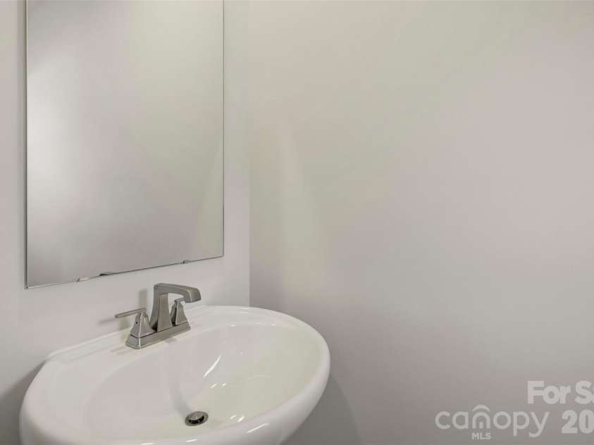 6330 Haller Street, Charlotte, NC 28227.  MLS# CAR4384144, YatesRealty ID 23703. First-Floor Powder Bathroom