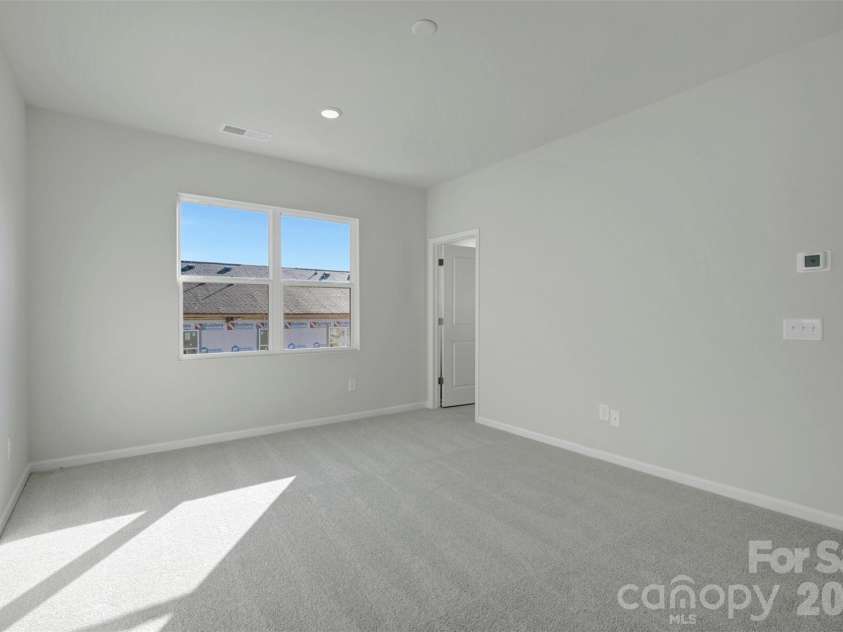6330 Haller Street, Charlotte, NC 28227.  MLS# CAR4384144, YatesRealty ID 23703. Light-Filled Primary Suite