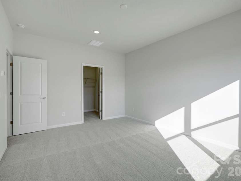 6330 Haller Street, Charlotte, NC 28227.  MLS# CAR4384144, YatesRealty ID 23703. Light-Filled Primary Suite