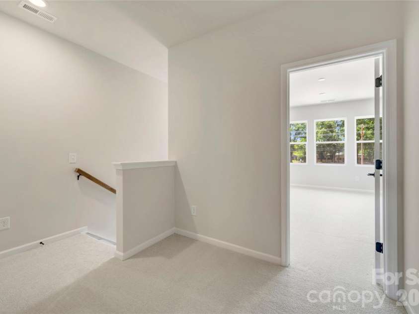 6334 Haller Street, Charlotte, NC 28227.  MLS# CAR4384161, YatesRealty ID 23705. Second floor landing