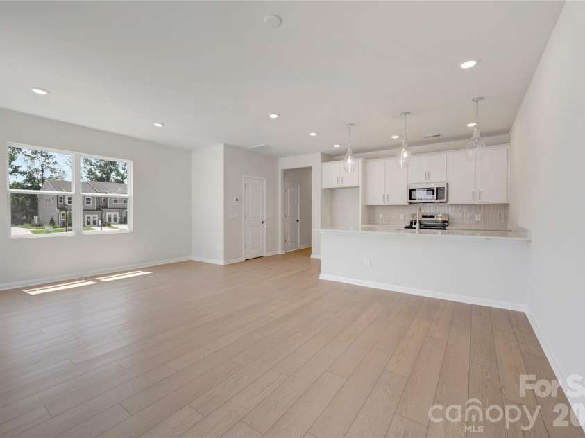 6326 Haller Street, Charlotte, NC 28227.  MLS# CAR4384192, YatesRealty ID 23709. End unit added windows for ample natural light