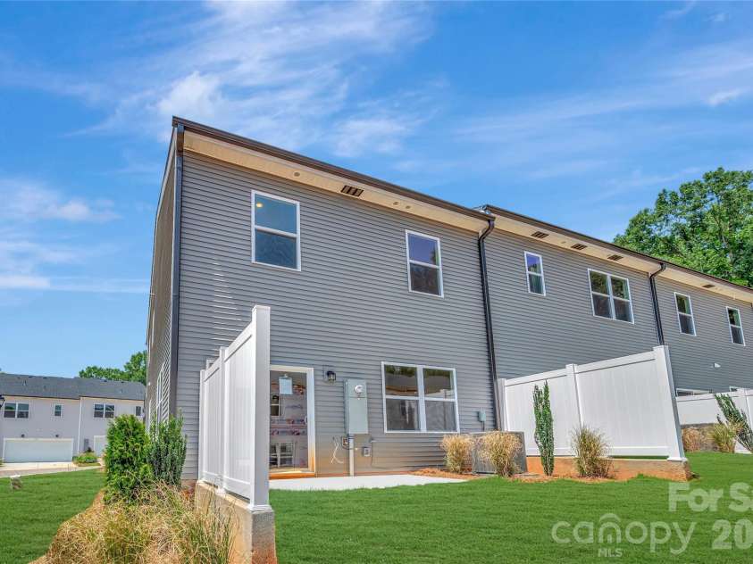 6326 Haller Street, Charlotte, NC 28227.  MLS# CAR4384192, YatesRealty ID 23709. End unit townhome