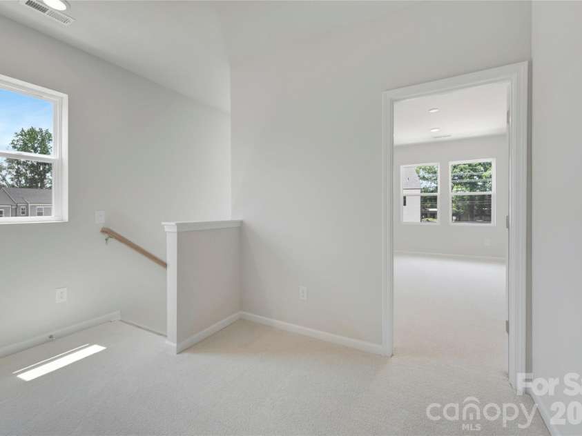 6326 Haller Street, Charlotte, NC 28227.  MLS# CAR4384192, YatesRealty ID 23709. Second floor landing