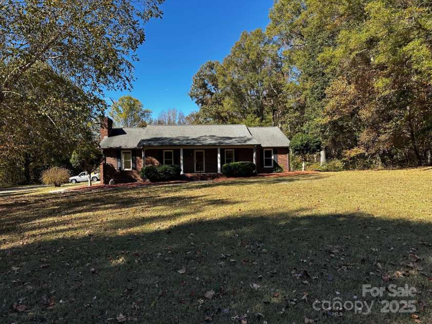 1080 Gin Road, Gold Hill, NC 28071.  MLS# CAR4308505, YatesRealty ID 2371. Deep set back offering privacy.