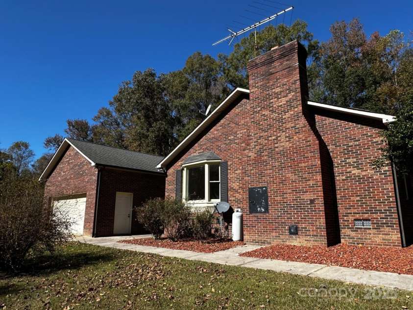 1080 Gin Road, Gold Hill, NC 28071.  MLS# CAR4308505, YatesRealty ID 2371. Side entry two car garage.