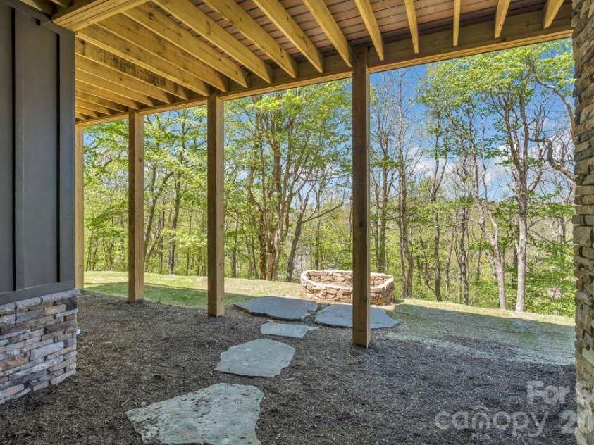 536 Boone Ridge Lane, Boone, NC 28607.  MLS# CAR4381577, YatesRealty ID 23712. Lower-level firepit area