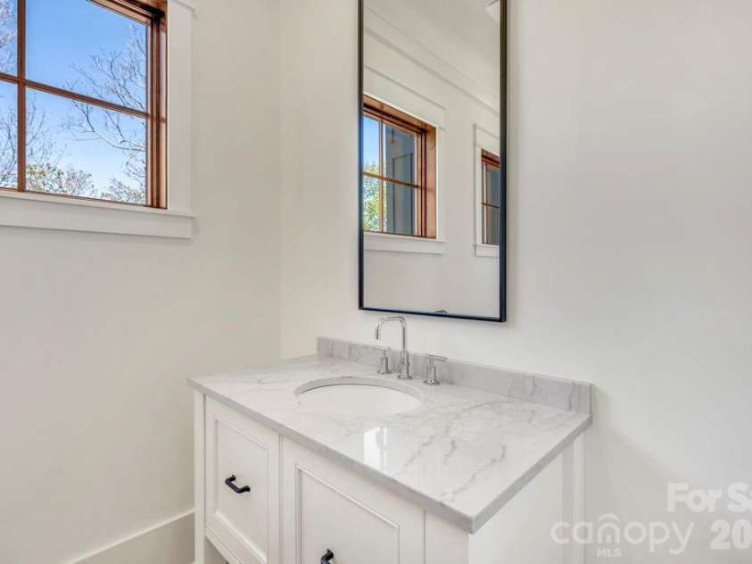 536 Boone Ridge Lane, Boone, NC 28607.  MLS# CAR4381577, YatesRealty ID 23712. Main-level half bath
