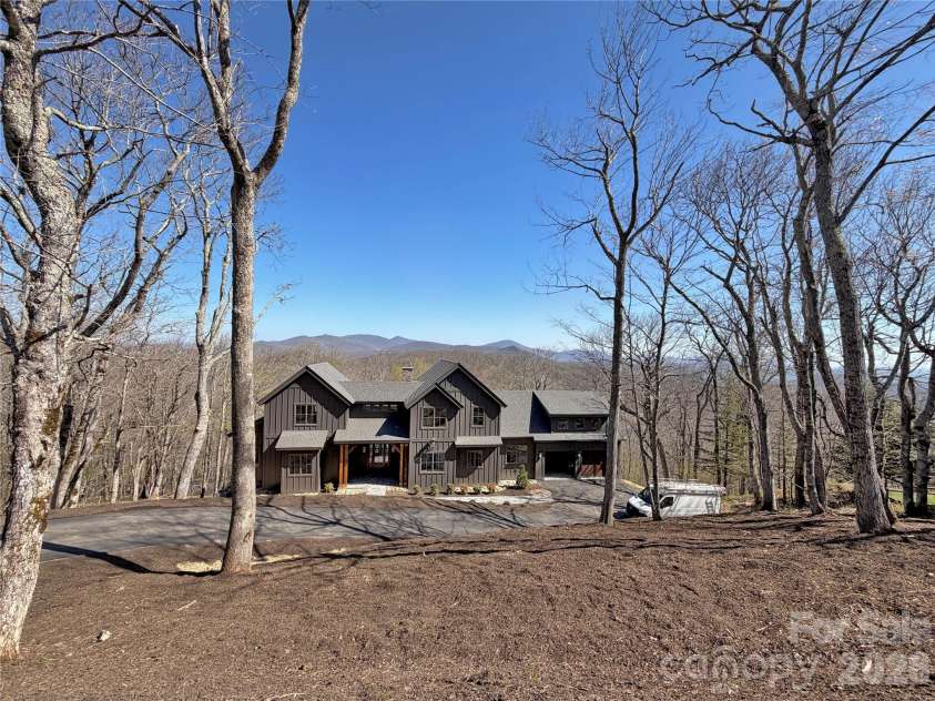 536 Boone Ridge Lane, Boone, NC 28607.  MLS# CAR4381577, YatesRealty ID 23712. Photo during construction, showing setting
