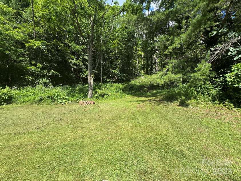 321 Skin Camp Creek Road, Todd, NC 28684.  MLS# CAR4277539, YatesRealty ID 23716. 