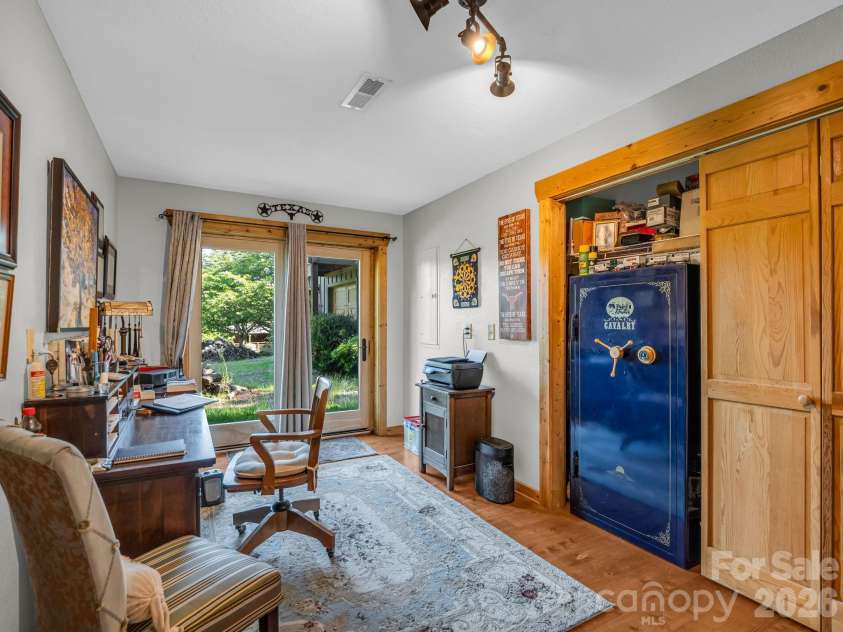 301 Peaks Drive, Lake Lure, NC 28746.  MLS# CAR4383996, YatesRealty ID 23717. Office/flex in basement